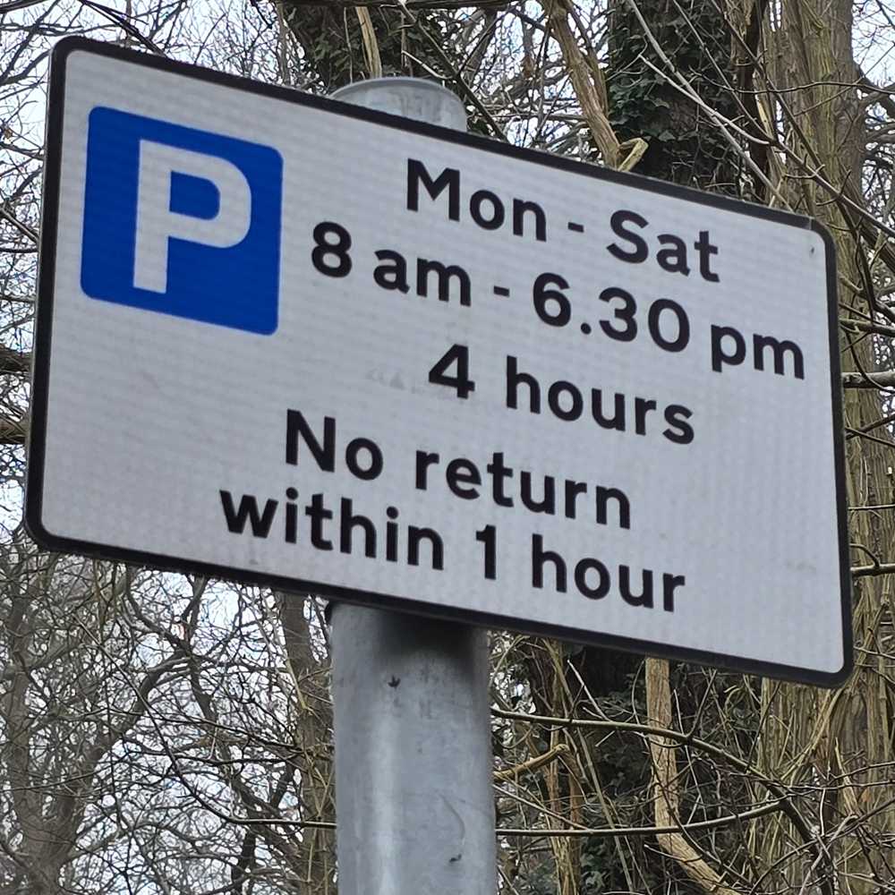Parking signs on New Road